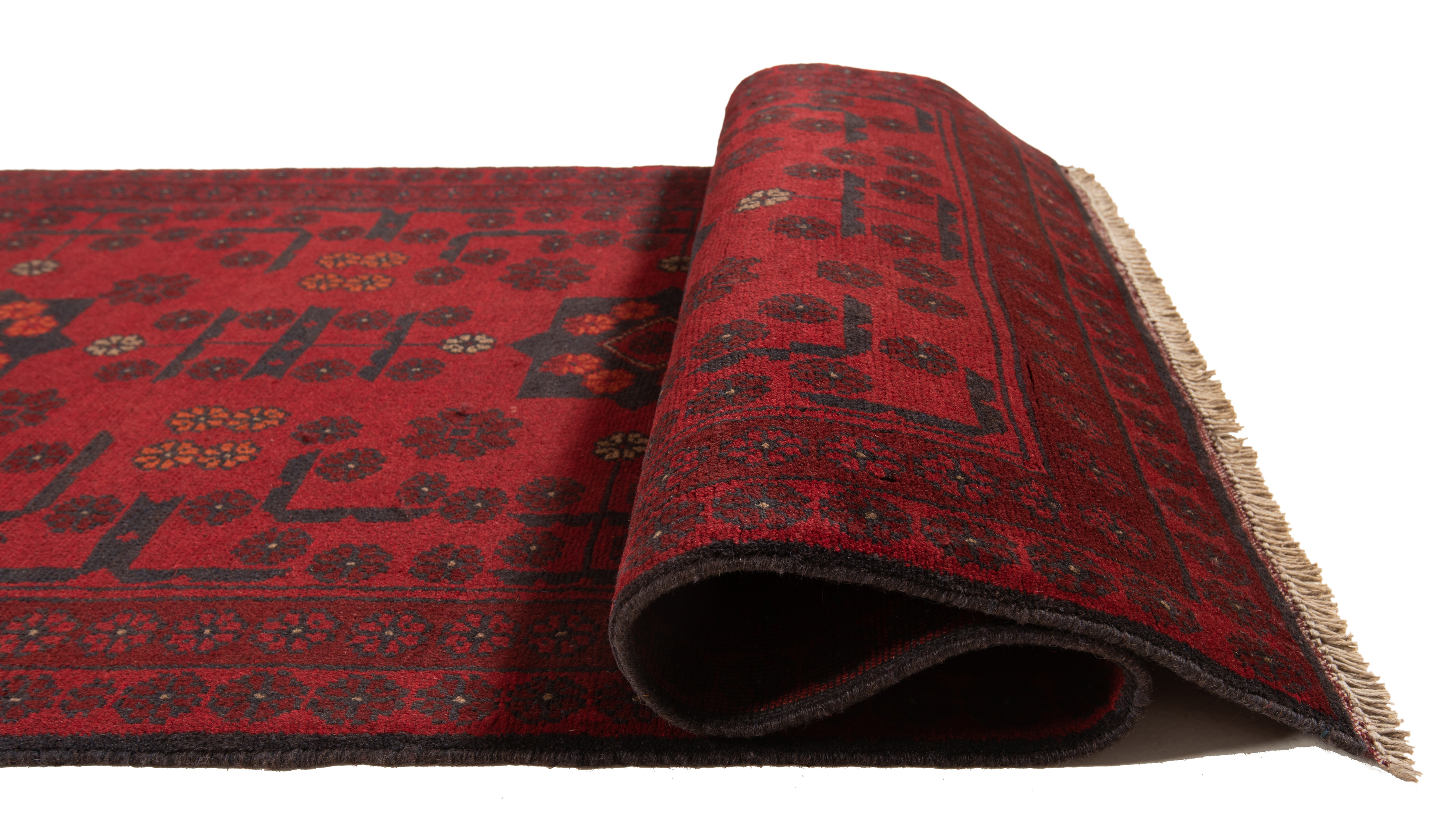 Tapis vintage en laine noué à la main, design vase floral